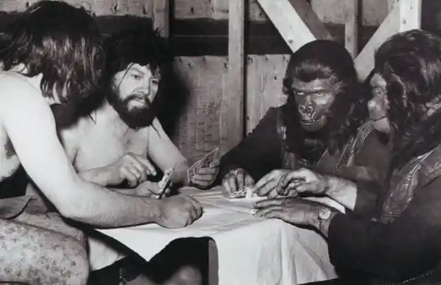 Card Game On Set Of 'Planet Of The Apes' Shows Humans And Apes Can Get Along After All