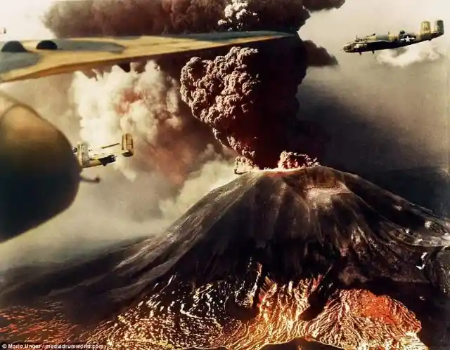 B-25 bombers fly over Mount Vesuvius in Italy while it erupts in March 1944 during the Italian Campaign of World War II
